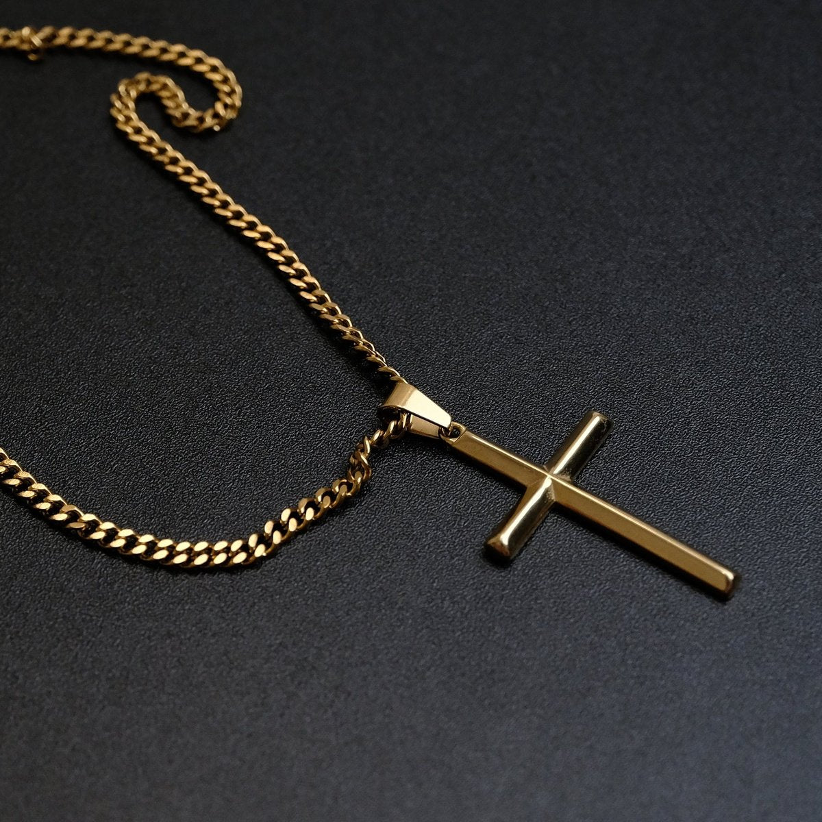 cross(gold-triangular)